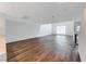 Spacious living room with hardwood floors and large window at 247 Dougram Ave, Las Vegas, NV 89101