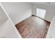 Spacious loft with large window and wood floors at 247 Dougram Ave, Las Vegas, NV 89101