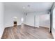 Large main bedroom with wood floors and ensuite bathroom at 247 Dougram Ave, Las Vegas, NV 89101