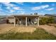 Large backyard patio with seating area and built-in grill at 250 Tonalea Ave, Henderson, NV 89015