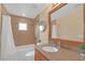 Bathroom with tub, shower, and granite vanity at 250 Tonalea Ave, Henderson, NV 89015