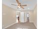 Spacious bedroom with ceiling fan and carpet at 250 Tonalea Ave, Henderson, NV 89015