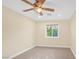 Bright bedroom with ceiling fan and carpet at 250 Tonalea Ave, Henderson, NV 89015