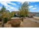 Single story home with landscaped front yard, walkway, and two-car garage at 250 Tonalea Ave, Henderson, NV 89015