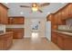 Updated kitchen featuring wood cabinets, tile flooring and a breakfast bar at 250 Tonalea Ave, Henderson, NV 89015