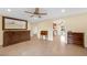 Bright living room with tile floors and built-in wooden cabinetry at 250 Tonalea Ave, Henderson, NV 89015