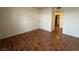 Bedroom with wood-look floors and bathroom access at 2606 S Durango Dr # 172, Las Vegas, NV 89117