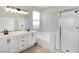 Bathroom features double sink vanity, separate shower, and tub at 283 Fancrest St, Henderson, NV 89052