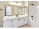 Bathroom vanity features a large mirror and dark hardware at 283 Fancrest St, Henderson, NV 89052