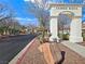 View of Copper Ridge community entrance with stone and well-manicured landscaping at 283 Fancrest St, Henderson, NV 89052