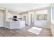 Beautiful kitchen with white cabinetry, stainless steel appliances, and a seamless flow into the dining area at 283 Fancrest St, Henderson, NV 89052