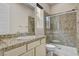 The bathroom features granite counters, tile floors, a glass-enclosed shower, and a white sink and toilet at 3 Hilltop Crest St, Henderson, NV 89011