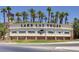 Lake Las Vegas community entrance with palm trees, manicured landscaping, and a welcoming sign at 3 Hilltop Crest St, Henderson, NV 89011