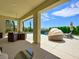 Covered patio with pool and seating area at 3 Hilltop Crest St, Henderson, NV 89011