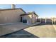 Exterior view of the backyard, with a large parking area, and access to the garage at 3101 S Spy Glass Ave, Pahrump, NV 89048