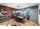 Charming dining area features stylish wood flooring and rustic design at 3101 S Spy Glass Ave, Pahrump, NV 89048