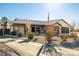 Attractive single-story home with well-maintained landscaping and charming front porch at 3101 S Spy Glass Ave, Pahrump, NV 89048