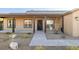 Inviting front porch with brick walkway and view of landscaping at 3101 S Spy Glass Ave, Pahrump, NV 89048