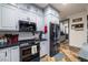 Kitchen showcasing stainless steel appliances and gray cabinets at 3101 S Spy Glass Ave, Pahrump, NV 89048