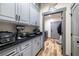 Pantry with gray cabinets at 3101 S Spy Glass Ave, Pahrump, NV 89048