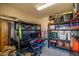 Organized storage room with shelves and bins offers ample space for tools, equipment, and household items at 3101 S Spy Glass Ave, Pahrump, NV 89048