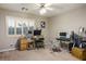 Spacious bedroom with plantation shutters on the window and a built-in desk and shelving area at 3146 Surf Spray St, Las Vegas, NV 89117