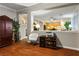 Open-concept living room showcasing hardwood floors with a view of the kitchen at 3146 Surf Spray St, Las Vegas, NV 89117