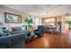 Well-decorated living room opens into the dining room, featuring hardwood floors at 3146 Surf Spray St, Las Vegas, NV 89117