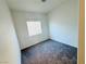 Bright bedroom with neutral walls and carpet flooring at 3205 Mystic Ridge Ct, Las Vegas, NV 89129