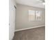 Simple bedroom with neutral walls and carpet flooring at 3305 Cutty Sark St, Las Vegas, NV 89117