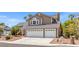 Charming two-story home featuring a three-car garage and well-maintained landscaping at 3305 Cutty Sark St, Las Vegas, NV 89117