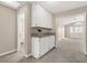 Home hallway with built-in cabinets and granite countertop at 3305 Cutty Sark St, Las Vegas, NV 89117