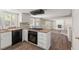 Kitchen with stainless steel appliances, granite countertops, and white cabinets at 3305 Cutty Sark St, Las Vegas, NV 89117