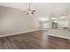 Bright living room with vaulted ceilings and wood-look floors at 3305 Cutty Sark St, Las Vegas, NV 89117