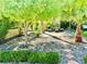 Landscaped backyard with patio, trees and stone pathway at 3398 El Camino Real, Las Vegas, NV 89121