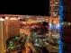 Nighttime view showcasing the sparkling lights of the Las Vegas cityscape and surrounding buildings at 3722 Las Vegas Blvd # 3209, Las Vegas, NV 89158