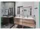 Modern bathroom with double vanity and glass shower at 3757 Grand Viewpoint Ct, Las Vegas, NV 89147