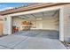 Two-car garage with built-in shelving and storage at 3757 Grand Viewpoint Ct, Las Vegas, NV 89147