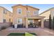 Back of home featuring a covered patio, yard, grill, and table seating at 3770 S Rosy Carina Pl, Henderson, NV 89052