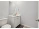 Bathroom features a white vanity, modern sink fixtures and a mirror at 3770 S Rosy Carina Pl, Henderson, NV 89052