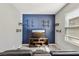 Bedroom featuring a TV, shelving and two reclining chairs at 3770 S Rosy Carina Pl, Henderson, NV 89052