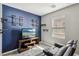 Bedroom featuring a TV, shelving and two reclining chairs at 3770 S Rosy Carina Pl, Henderson, NV 89052