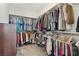 Spacious walk-in closet with ample storage and clothing racks at 3770 S Rosy Carina Pl, Henderson, NV 89052