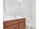 Clean bathroom with vanity, toilet, and bathtub at 4050 Sparrow Rock St, Las Vegas, NV 89129