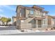 Two-story house with a neutral color scheme and a fenced yard at 4050 Sparrow Rock St, Las Vegas, NV 89129