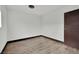 Bedroom featuring wood-look floors and neutral walls at 4151 Calimesa St, Las Vegas, NV 89115