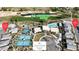 Overhead view of the neighborhood amenities including golf course, pool, tennis courts, and clubhouse location at 4267 E Highvale Ct, Pahrump, NV 89061