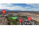 Aerial view of the neighborhood shows the location of Mountain Falls Golf Club and Cactus Canyon Dr at 4267 E Highvale Ct, Pahrump, NV 89061