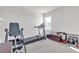 Simple exercise room with treadmill and bench, offering space for a home fitness setup at 4267 E Highvale Ct, Pahrump, NV 89061