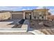 Charming single-story home features a low-maintenance yard and attached two car garage at 4267 E Highvale Ct, Pahrump, NV 89061